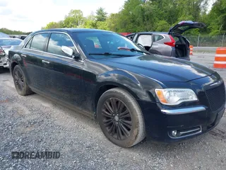2012 Chrysler 300 Limited with VIN 2C3CCAHG1CH122981, listed as a IAAI auction lot 42227255 with 161,879 mi miles and . Bid and sale history available at DreamBid. Image 1.