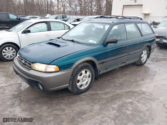 1997 Subaru Legacy Wagon Outback with VIN 4S3BG685XV7654378, listed as a IAAI auction lot 41666575 with 248,484 mi miles. Bid and sale history available at carsss.com. Image 2.