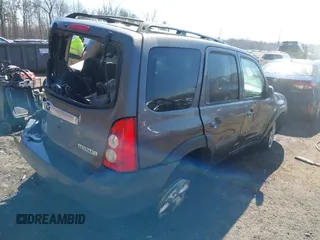2006 Mazda Tribute i with VIN 4F2YZ92Z16KM25216, listed as a IAAI auction lot 41664006 with 228,222 mi miles and . Bid and sale history available at carsss.com. Image 4.