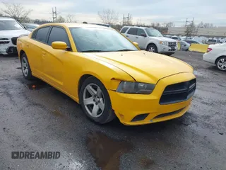 2014 Dodge Charger Police with VIN 2C3CDXAT9EH350916, listed as a IAAI auction lot 42030015 with 222,044 mi miles. Bid and sale history available at carsss.com. Image 1.