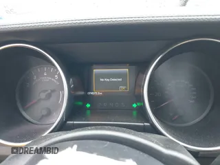 2020 Ford Mustang EcoBoost z VIN 1FATP8UH7L5131625, wystawiony jako IAAI lot #42295906 z przebiegiem 74 572 mil mil oraz . Historia ofert i sprzedaży dostępna na DreamBid. Obrazek 7.