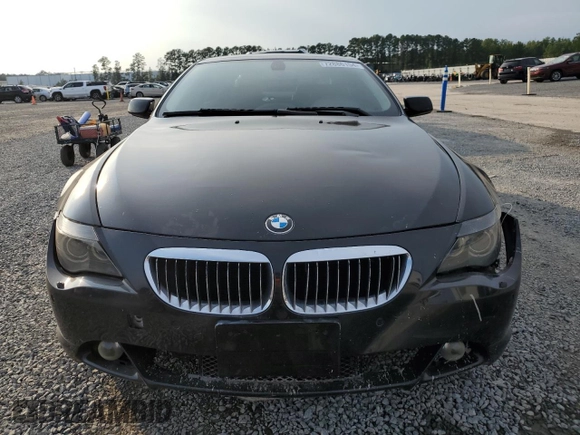 2007 BMW 6 Series 650i z VIN WBAEH13577CR52351, wystawiony jako Copart lot #72886154 z przebiegiem 77 410 mil mil oraz Szkoda całkowita • Salvage title. Historia ofert i sprzedaży dostępna na DreamBid. Obrazek 5.