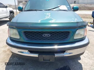 1998 Ford F-150 with VIN 1FTZX17W3WKB90294, listed as a IAAI auction lot 42676059 with 119,629 mi miles and . Bid and sale history available at DreamBid. Image 6.