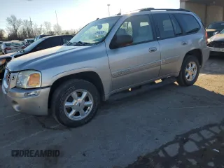 2005 GMC Envoy SLT with VIN 1GKDT13SX52276648, listed as a Copart auction lot 42944265 with 211,633 mi miles and Clean Title. Bid and sale history available at carsss.com. Image 1.