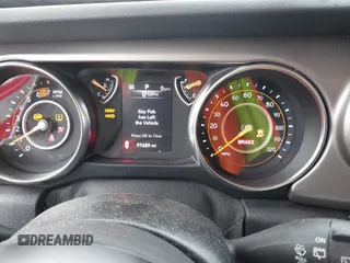 2020 Jeep Wrangler Unlimited Willys with VIN 1C4HJXDN8LW213889, listed as a IAAI auction lot 41561034 with 97,489 mi miles and . Bid and sale history available at DreamBid. Image 7.