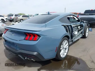 2024 Ford Mustang GT with VIN 1FA6P8CF5R5407998, listed as a IAAI auction lot 42228052 with 12,863 mi miles and . Bid and sale history available at DreamBid. Image 4.
