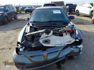 2005 Pontiac Grand Am GT with VIN 1G2NW12E65M156857, listed as a IAAI auction lot 41548935 with 199,420 mi miles. Bid and sale history available at carsss.com. Image 13.