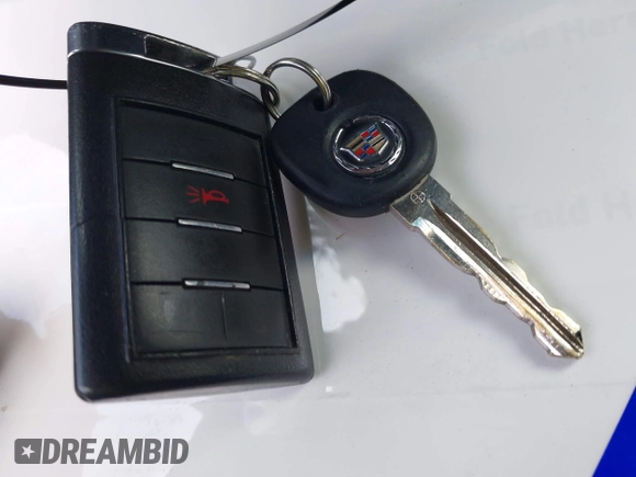 2013 Cadillac CTS Luxury with VIN 1G6DH5E58D0102036, listed as a IAAI auction lot 42270393 with 133,203 mi miles and . Bid and sale history available at DreamBid. Image 11.