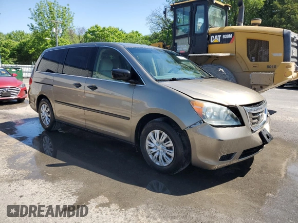2010 Honda Odyssey LX с VIN 5FNRL3H22AB062671, выставлен на аукционе Copart как лот 57466735 с пробегом 193 274 миль миль и Списание • Salvage title. История ставок и продаж доступна на DreamBid. Изображение 4.