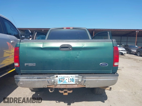 1999 Ford F-150 XL z VIN 2FTRX18L9XCA01139, wystawiony jako IAAI lot #42550053 z przebiegiem 263 950 mil mil oraz . Historia ofert i sprzedaży dostępna na DreamBid. Obrazek 16.