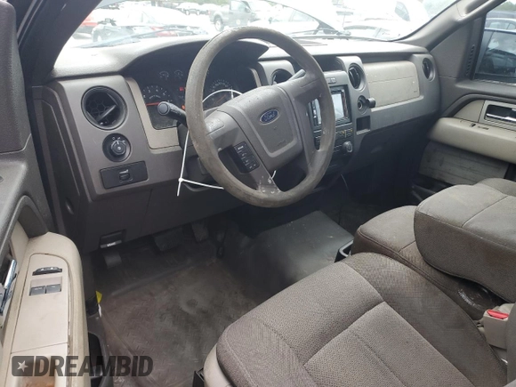 2010 Ford F-150 XL with VIN 1FTMF1CW1AKC09582, listed as a Copart auction lot 54296315 with 127,439 mi miles and Salvage title. Bid and sale history available at DreamBid. Image 8.
