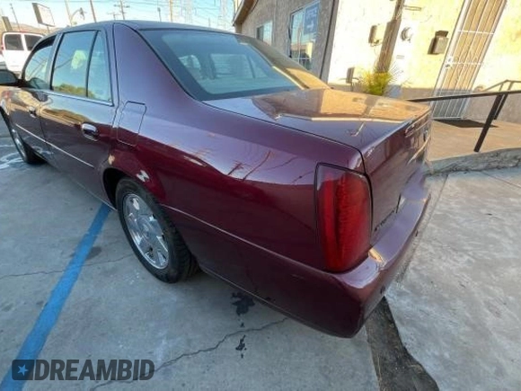 2002 Cadillac DeVille DTS with VIN 1G6KF57912U135771, listed as a Copart auction lot 82052554 with 56,268 mi miles and Clean Title. Bid and sale history available at carsss.com. Image 3.