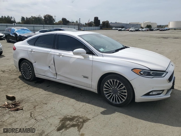 2017 Ford Fusion Energi Titanium with VIN 3FA6P0SUXHR313533, listed as a Copart auction lot 49813215 with 100,698 mi miles and Salvage Title. Bid and sale history available at carsss.com. Image 4.