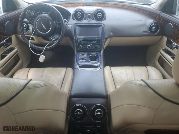 2011 Jaguar XJ with VIN SAJWA2GB2BLV01811, listed as a Copart auction lot 78380094 with 129,243 mi miles and Salvage Title. Bid and sale history available at carsss.com. Image 8.