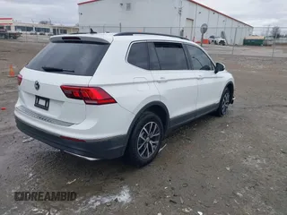 2020 Volkswagen Tiguan SE with VIN 3VV3B7AX2LM055418, listed as a IAAI auction lot 41248422 with Not Provided miles and . Bid and sale history available at DreamBid. Image 4.