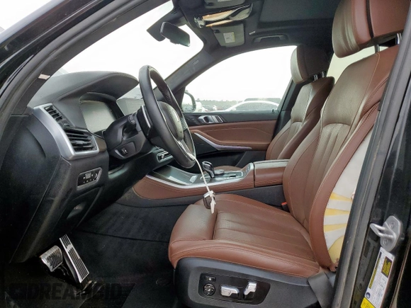 2022 BMW X5 xDrive40i with VIN 5UXCR6C01N9K79249, listed as a Copart auction lot 59142615 with 46,758 mi miles and Salvage title. Bid and sale history available at DreamBid. Image 7.