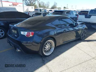 2016 Scion FR-S with VIN JF1ZNAA15G8703553, listed as a IAAI auction lot 41839670 with 73,538 mi miles. Bid and sale history available at carsss.com. Image 4.