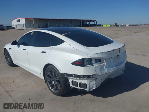 2022 Tesla Model S Plaid with VIN 5YJSA1E69NF486471, listed as a IAAI auction lot 41228818 with 49,207 mi miles and . Bid and sale history available at carsss.com. Image 3.