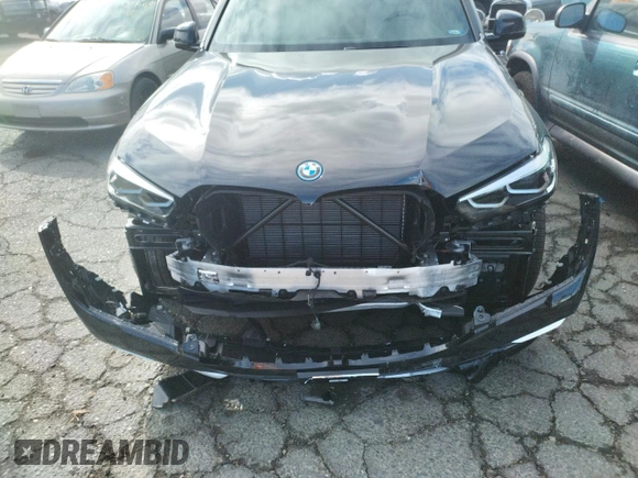 2022 BMW X5 xDrive45e with VIN 5UXTA6C01N9M84108, listed as a Copart auction lot 65150782 with 5,977 mi miles. Bid and sale history available at carsss.com. Image 9.