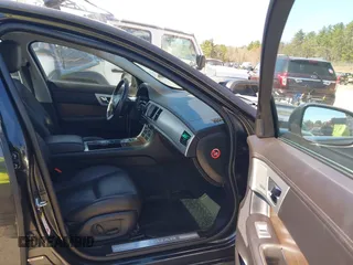 2014 Jaguar XF V6 SC with VIN SAJWJ0EF9E8U31032, listed as a IAAI auction lot 42046036 with 118,927 mi miles. Bid and sale history available at carsss.com. Image 5.