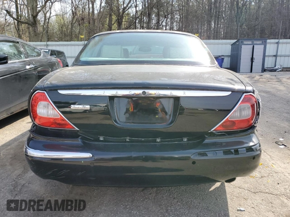 2005 Jaguar XJ Vanden Plas with VIN SAJWA82C55SG43618, listed as a Copart auction lot 47848515 with 237,224 mi miles and Salvage Title. Bid and sale history available at carsss.com. Image 6.