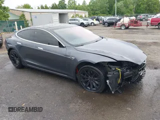 2016 Tesla Model S 70 with VIN 5YJSA1E17GF174544, listed as a IAAI auction lot 42221358 with 114,354 mi miles and . Bid and sale history available at DreamBid. Image 1.