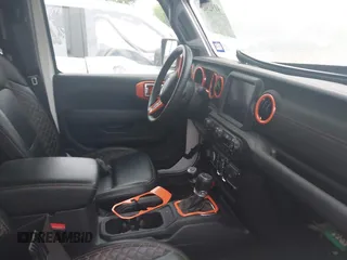 2023 Jeep Gladiator Overland z VIN 1C6HJTFGXPL522706, wystawiony jako IAAI lot #41923655 z przebiegiem 33 010 mil mil oraz . Historia ofert i sprzedaży dostępna na DreamBid. Obrazek 5.