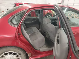 1998 Ford Taurus SE Comfort z VIN 1FAFP53S4WA168846, wystawiony jako IAAI lot #42482348 z przebiegiem 140 194 mil mil oraz . Historia ofert i sprzedaży dostępna na DreamBid. Obrazek 8.