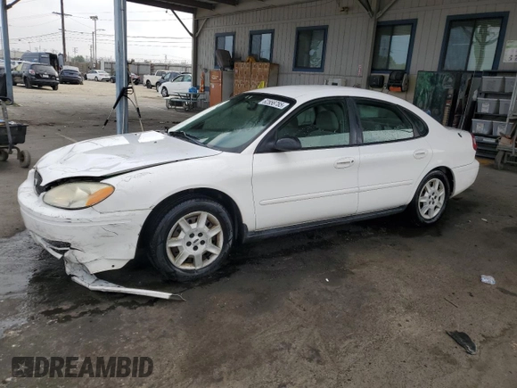 2006 Ford Taurus SE with VIN 1FAHP53U86A237001, listed as a Copart auction lot 62858785 with 133,697 mi miles and Salvage title. Bid and sale history available at DreamBid. Image 1.
