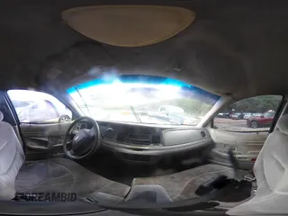2001 Ford Crown Victoria Police Interceptor z VIN 2FAFP71W21X165218, wystawiony jako IAAI lot #42062199 z przebiegiem 233 978 mil mil oraz . Historia ofert i sprzedaży dostępna na DreamBid. Obrazek 20.