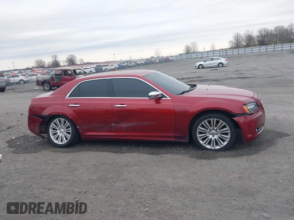 2012 Chrysler 300 Limited z VIN 2C3CCACG7CH250858, wystawiony jako IAAI lot #41709739 z przebiegiem 236 991 mil mil oraz . Historia ofert i sprzedaży dostępna na DreamBid. Obrazek 13.