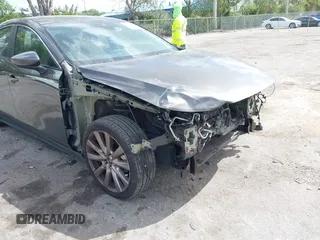 2020 Mazda 3 Select z VIN 3MZBPACL9LM127098, wystawiony jako IAAI lot #41948541 z przebiegiem 67 431 mil mil oraz . Historia ofert i sprzedaży dostępna na DreamBid. Obrazek 18.