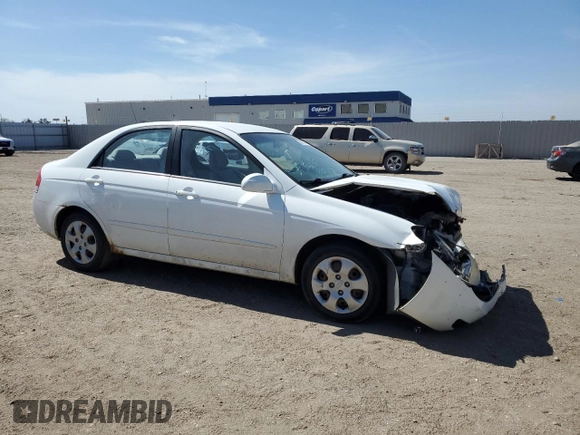 2007 Kia Spectra EX with VIN KNAFE121775460533, listed as a Copart auction lot 50873075 with 116,433 mi miles and Salvage Title. Bid and sale history available at carsss.com. Image 4.