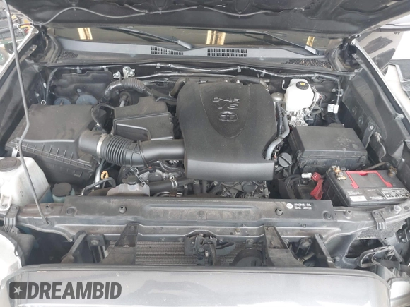 2019 Toyota Tacoma SR z VIN 3TMCZ5AN1KM257081, wystawiony jako IAAI lot #42211385 z przebiegiem 60 229 mil mil oraz . Historia ofert i sprzedaży dostępna na DreamBid. Obrazek 10.