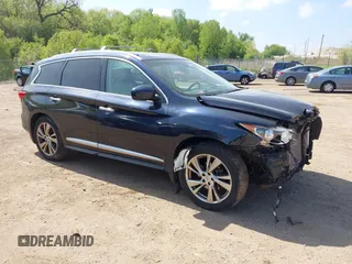 2015 Infiniti QX60 with VIN 5N1AL0MM8FC520975, listed as a IAAI auction lot 42261719 with 125,732 mi miles and . Bid and sale history available at DreamBid. Image 1.