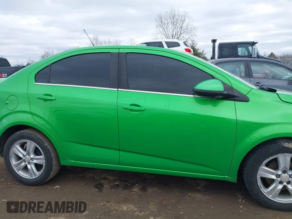 2015 Chevrolet Sonic LT with VIN 1G1JC5SH7F4104412, listed as a IAAI auction lot 41737655 with 124,304 mi miles and . Bid and sale history available at DreamBid. Image 13.