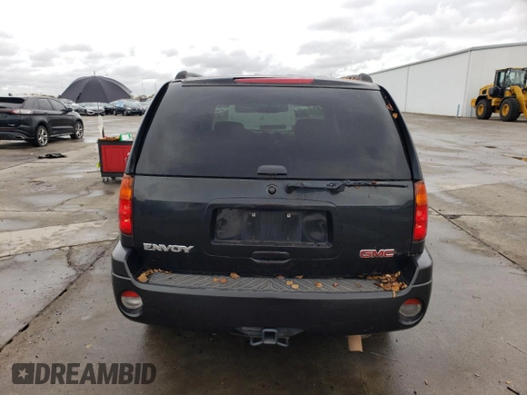 2003 GMC Envoy SLE with VIN 1GKDS13S632226264, listed as a Copart auction lot 82461694 with Not Provided miles and Clean Title. Bid and sale history available at carsss.com. Image 6.