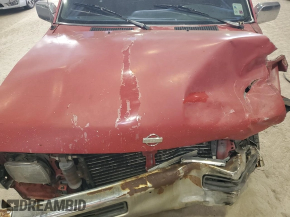1995 Nissan Frontier with VIN 1N6SD11S6SC434201, listed as a Copart auction lot 60198815 with 222,938 mi miles and Salvage title. Bid and sale history available at DreamBid. Image 11.