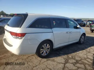 2014 Honda Odyssey EX-L with VIN 5FNRL5H61EB005740, listed as a Copart auction lot 54663595 with 118,971 mi miles and Salvage Title. Bid and sale history available at DreamBid. Image 3.