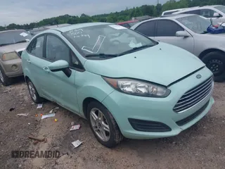 2017 Ford Fiesta SE z VIN 3FADP4BJ3HM121307, wystawiony jako IAAI lot #42251500 z przebiegiem 87 215 mil mil oraz . Historia ofert i sprzedaży dostępna na DreamBid. Obrazek 1.