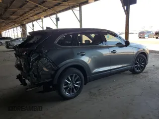 2021 Mazda CX-9 Touring z VIN JM3TCACYXM0520912, wystawiony jako Copart lot #60726695 z przebiegiem 36 506 mil mil oraz Szkoda całkowita • Salvage title. Historia ofert i sprzedaży dostępna na DreamBid. Obrazek 3.