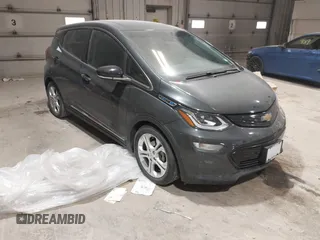 2021 Chevrolet Bolt EV LT z VIN 1G1FY6S05M4111315, wystawiony jako IAAI lot #41511422 z przebiegiem 14 433 mil mil oraz . Historia ofert i sprzedaży dostępna na DreamBid. Obrazek 1.