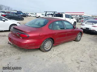 1998 Ford Taurus SE Comfort with VIN 1FAFP53S2WA255080, listed as a IAAI auction lot 41541015 with 196,604 mi miles. Bid and sale history available at carsss.com. Image 4.