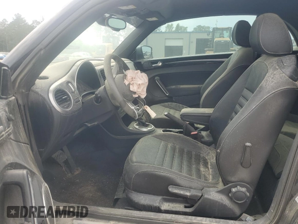 2014 Volkswagen Beetle 1.8T w/Premium z VIN 3VW517AT6EM816698, wystawiony jako Copart lot #57344055 z przebiegiem 52 782 mil mil oraz Szkoda całkowita • Salvage title. Historia ofert i sprzedaży dostępna na DreamBid. Obrazek 7.