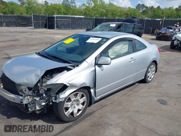 2010 Honda Civic Cpe LX with VIN 2HGFG1B68AH530485, listed as a IAAI auction lot 41907809 with 275,653 mi miles. Bid and sale history available at carsss.com. Image 2.
