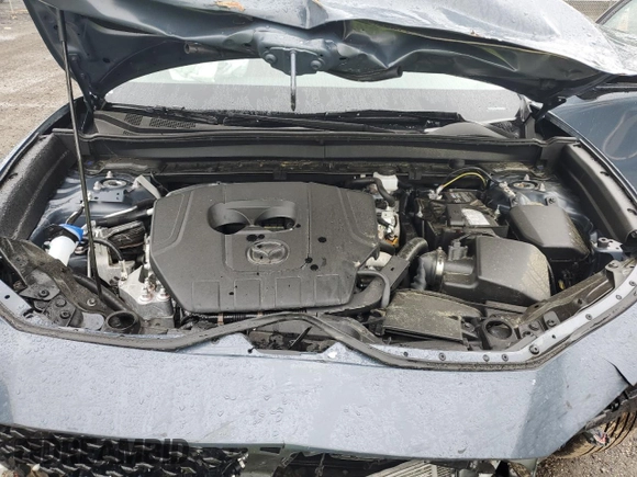 2025 Mazda CX-30 S Carbon Edition z VIN 3MVDMBCM9SM800942, wystawiony jako Copart lot #61013845 z przebiegiem 6 282 mil mil oraz Nie do naprawy • Non repairable. Historia ofert i sprzedaży dostępna na DreamBid. Obrazek 12.