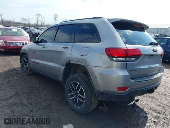 2021 Jeep Grand Cherokee Trailhawk with VIN 1C4RJFLG6MC683973, listed as a IAAI auction lot 41662344 with 95,890 mi miles. Bid and sale history available at carsss.com. Image 3.