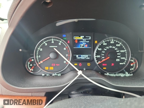 2014 Subaru Outback Limited with VIN 4S4BRBLC6E3304404, listed as a Copart auction lot 63922815 with 107,827 mi miles and Salvage title. Bid and sale history available at DreamBid. Image 9.