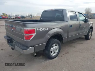 2009 Ford F-150 XL with VIN 1FTPW14V99KC52405, listed as a IAAI auction lot 41510394 with 166,245 mi miles. Bid and sale history available at carsss.com. Image 4.