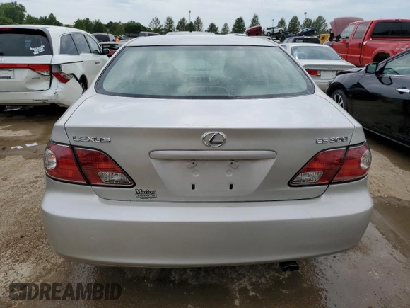 2003 Lexus ES 300 with VIN JTHBF30G036020559, listed as a Copart auction lot 56935124 with 182,366 mi miles and Salvage Title. Bid and sale history available at DreamBid. Image 6.
